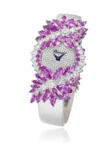 Pink sapphire diamond watch in 18ct white gold, set with automatic movement, 44 marquise-cut pink sapphires (20cts) and diamonds (4cts).